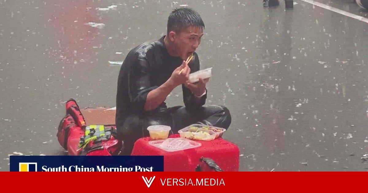 Video capturing Chinese firefighter eating in rain during flood relief goes viral